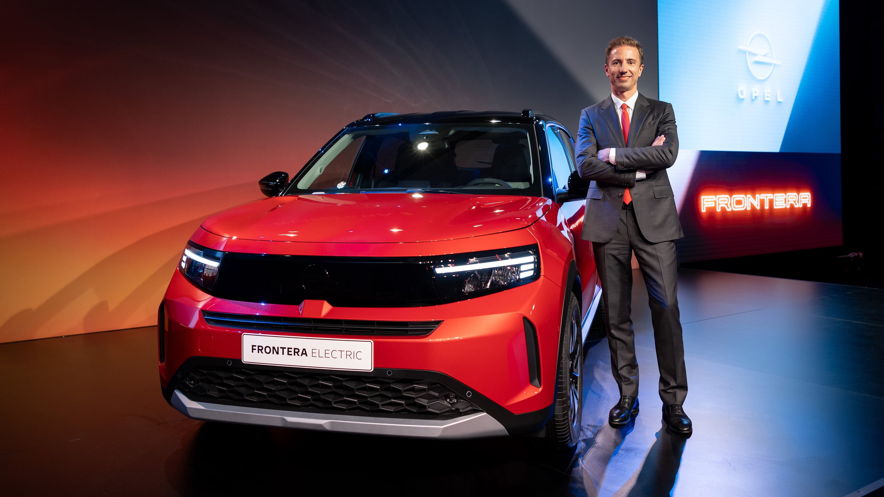 Opel CEO Florian Huettl with Opel Frontera Arc 2024