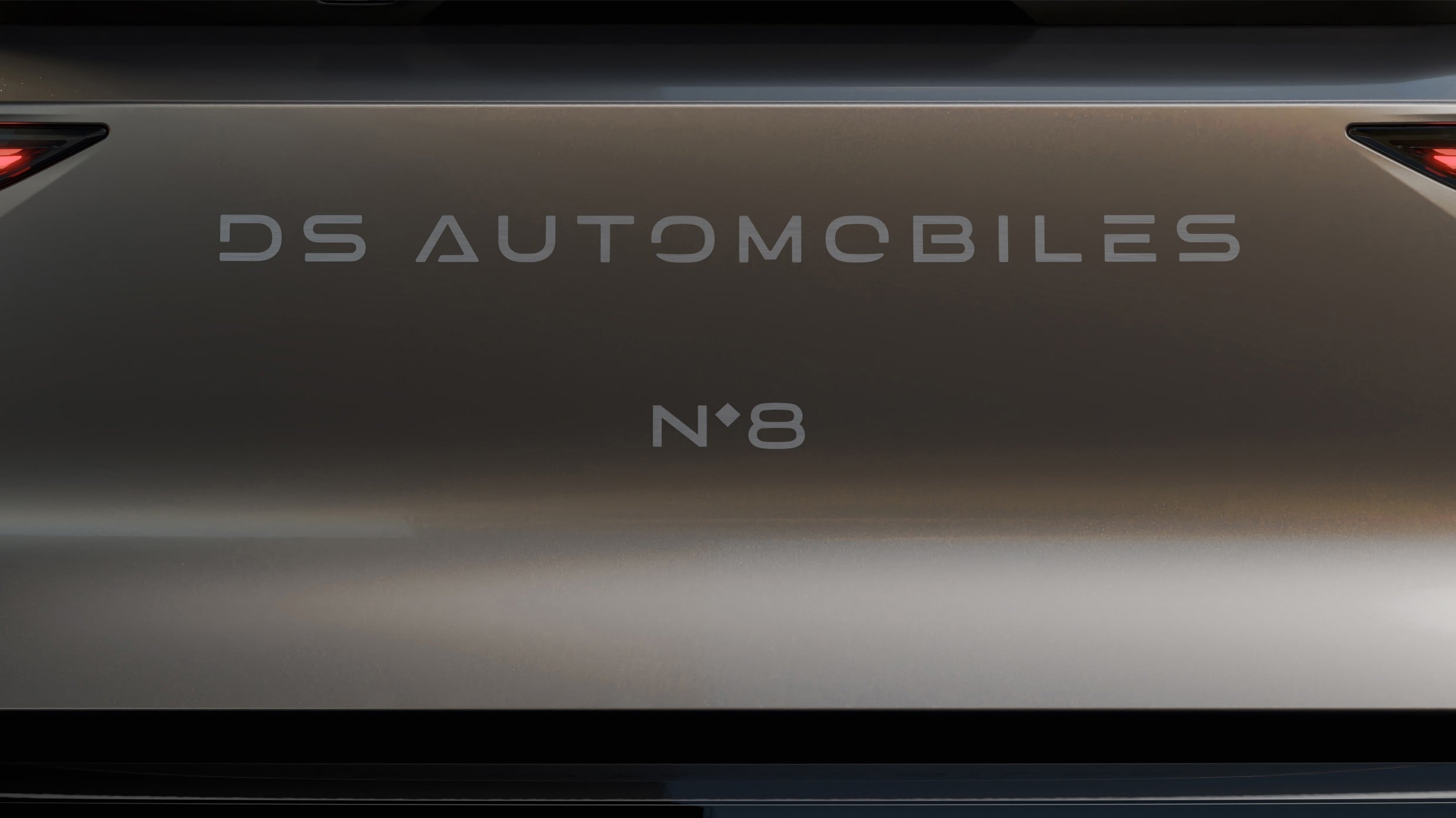 The words "DS Automobiles" in white on a silver hatchback on the new No. 8 model.